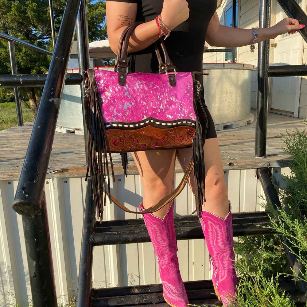 This 100% Genuine Cowhide & Tooled Leather Bag is pure luxury.   Sells for $300